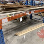 Destroyed pallet racking frame and beam