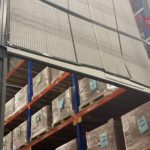 Damaged wire mesh panel in aerosol cage