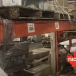 Pallet rack beam falling out of frame