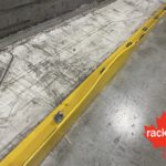 Damaged angle iron floor guard