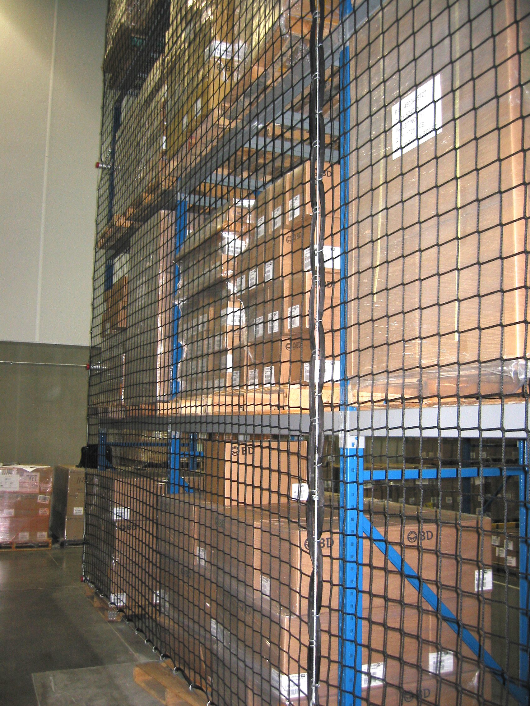 How Safety Netting Reduces Liability in High-Bay Storage